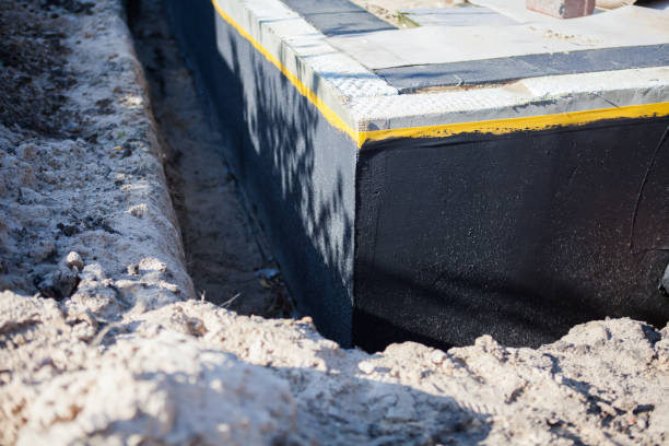 Professional Basement Waterproofing technician working in Denmark, WI